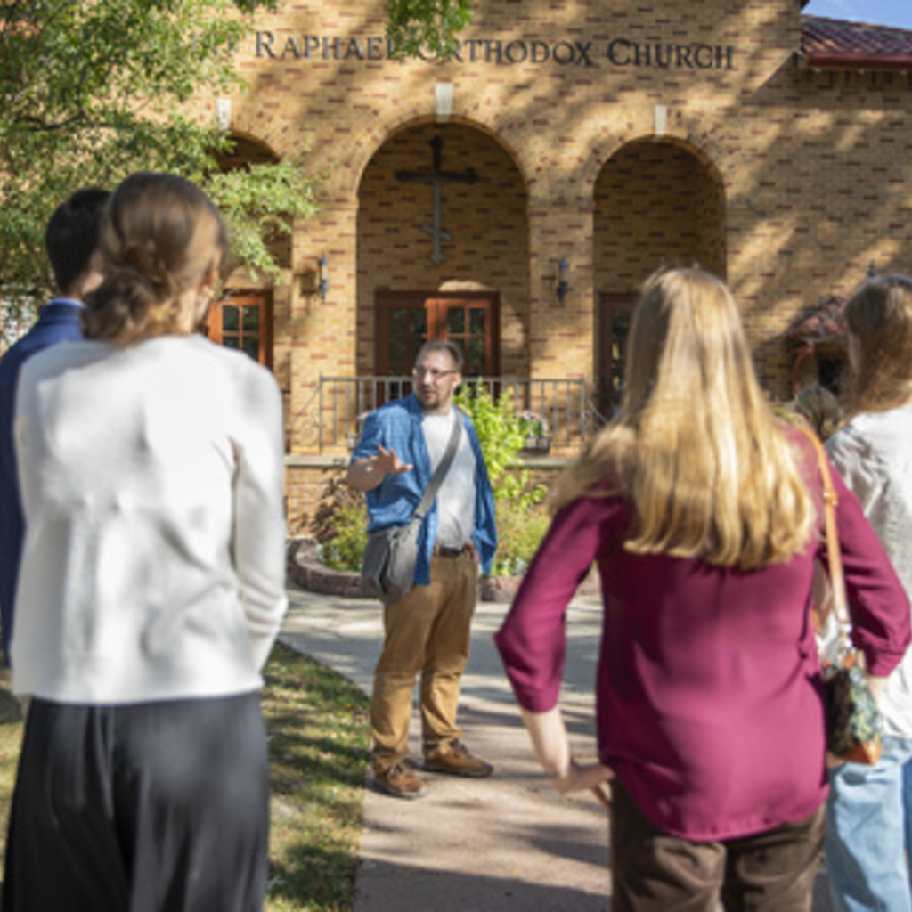 Brandon Dean in front of a church