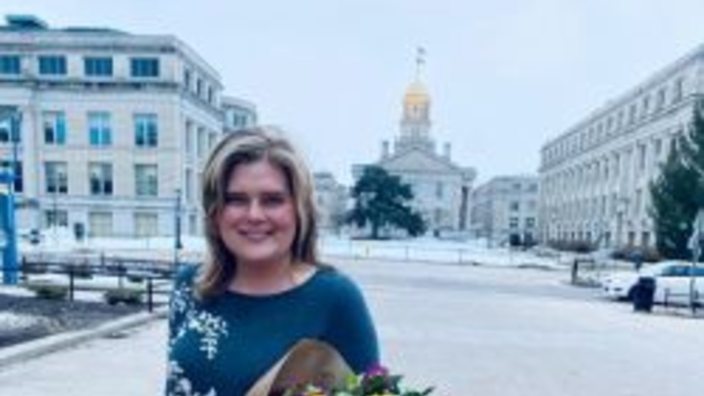 Dr. Emma Rifai stands outside the Old Capital Building